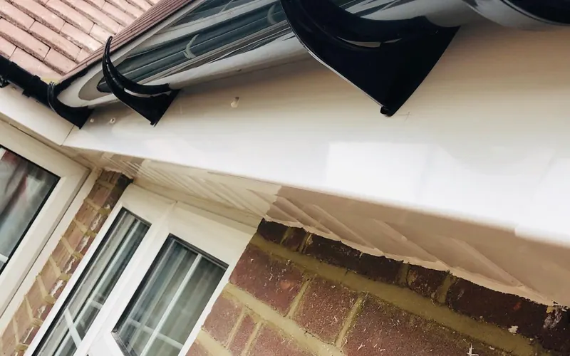 Close-up of new white uPVC fascia, soffit and guttering fitted by JFC Roofing and Building